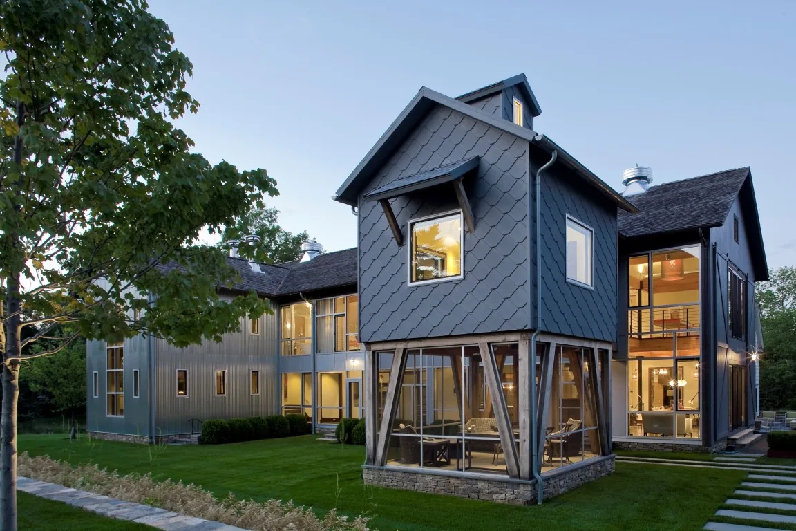 Screened porch enclosure built by Connecticut Enclosures & Screens, with aluminum screen wall panels overlooking a lawn